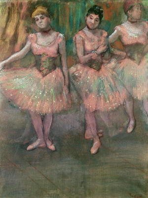 Dancers wearing salmon coloured skirts
